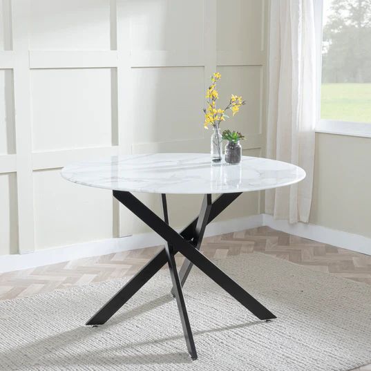 Ravenna Glass 4 Seater Round Dining Table with Black Metal Chopstick Legs